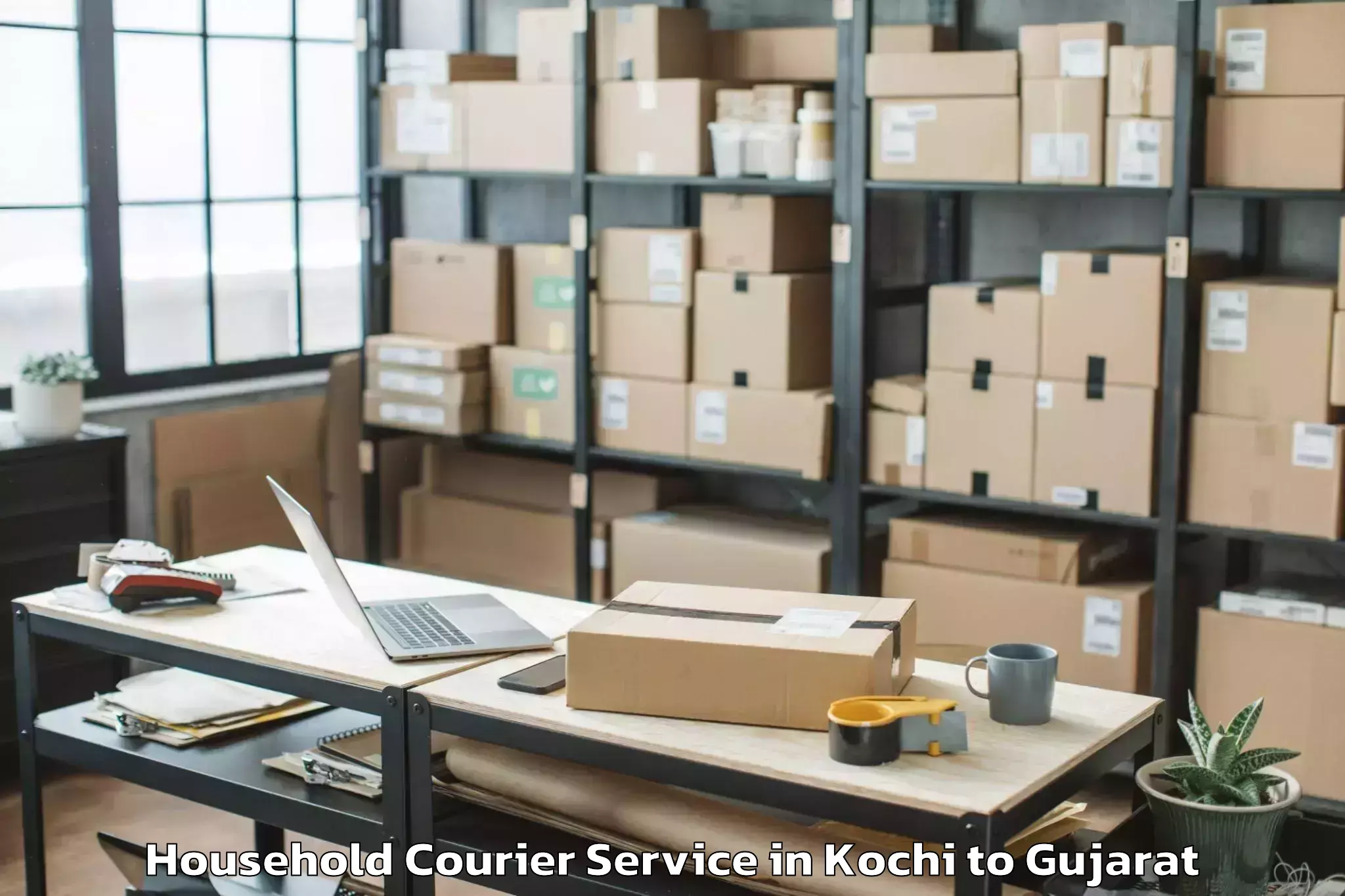 Comprehensive Kochi to Saurashtra University Rajkot Household Courier